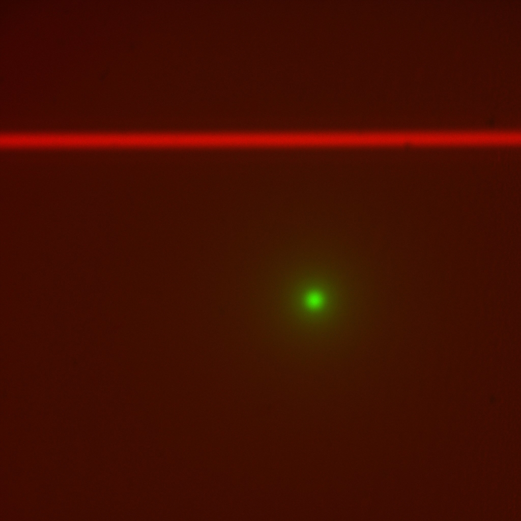 With correct dichroic tilt, the beam appears horizontal and in focus; this image was taken in Multi camera view so the epi-spot of the same beam is visible